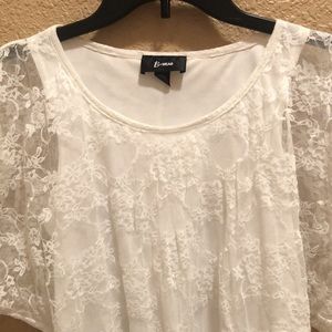 Worn once B.Wear lace top. Lining underneath. Banded sheer lace bottom. White.